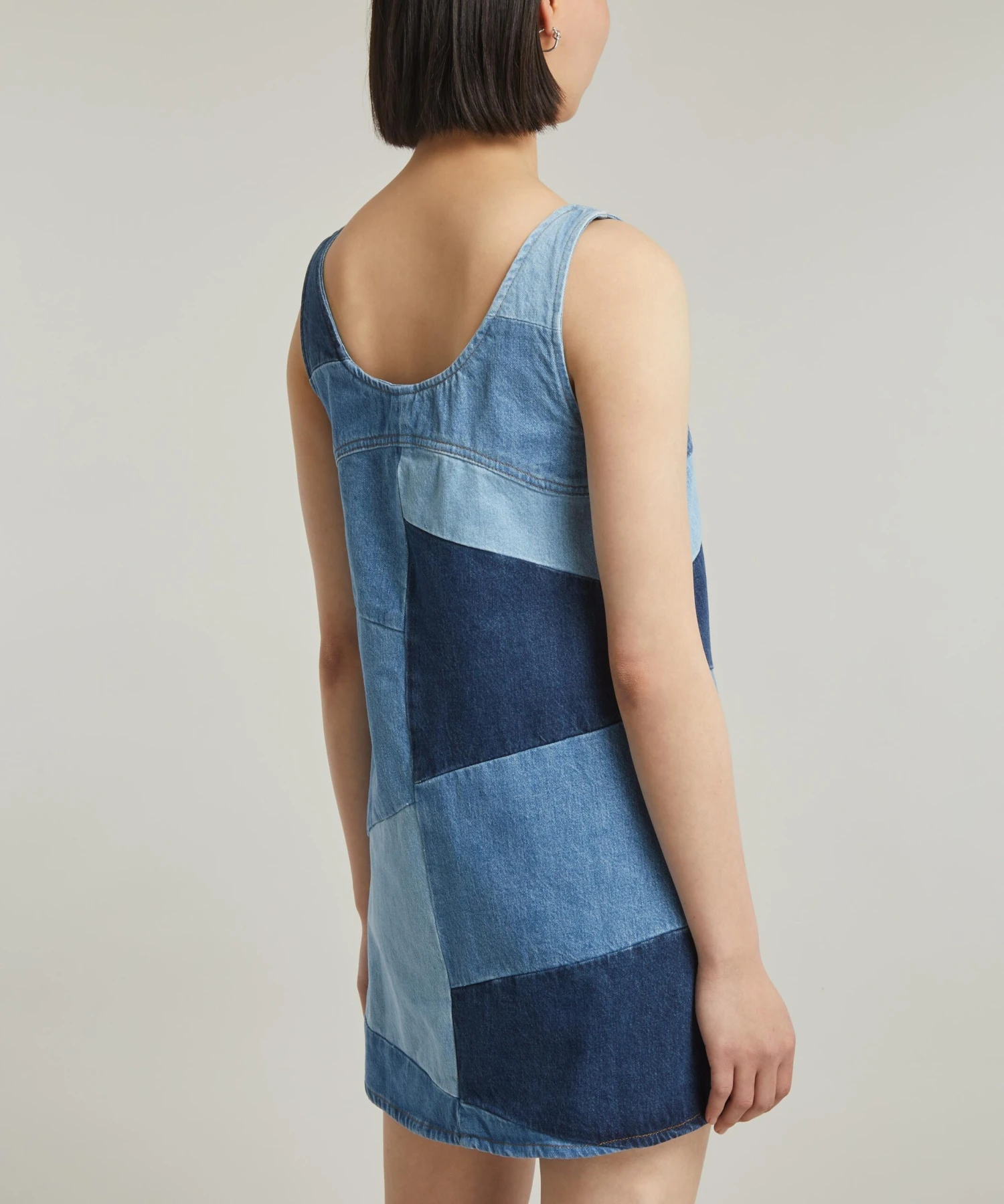 FRAME Patchwork Micro Flare Denim Mini-Dress 4 FRAME Patchwork Micro Flare Denim Mini-Dress - Image 4
